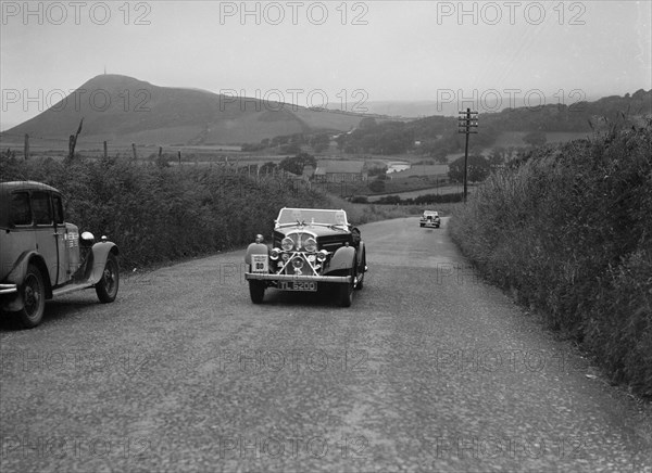 Rover 12/4 of WP Maidens competing in the South Wales Auto Club Welsh Rally, 1937 Artist: Bill Brunell.