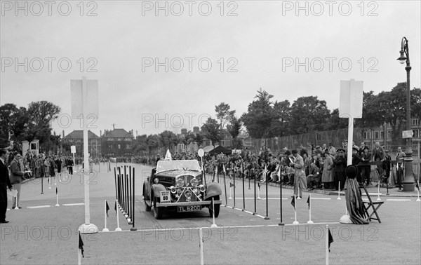 Rover 12/4 of WP Maidens competing in the South Wales Auto Club Welsh Rally, 1937 Artist: Bill Brunell.