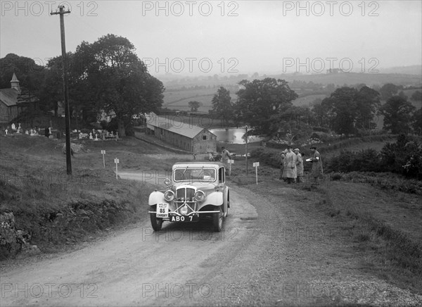 BSA saloon of RS Bevan competing in the South Wales Auto Club Welsh Rally, 1937 Artist: Bill Brunell.