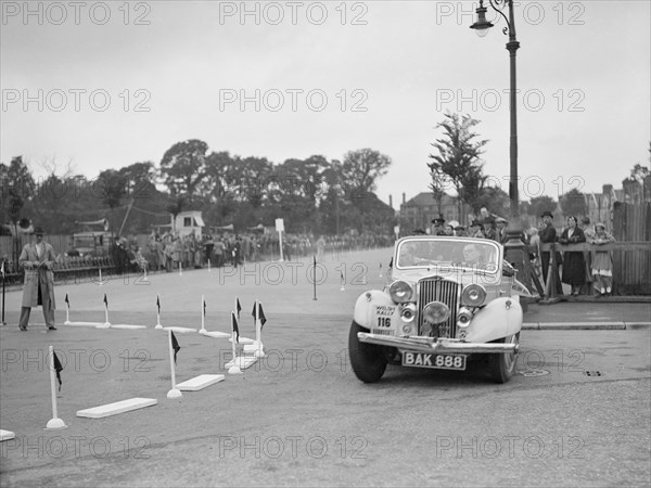 Talbot 10 drophead coupe of RM Proctor competing in the South Wales Auto Club Welsh Rally, 1937 Artist: Bill Brunell.