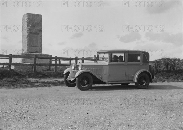 Kitty Brunell's Bianchi saloon beside the Cricket Monument, Hambledon, Hampshire, 1930s Artist: Bill Brunell.