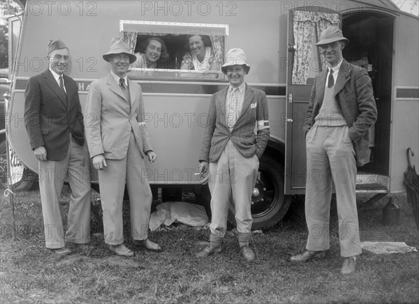 Group portrat at Shelsley Walsh, Worcestershire, during the Blackpool Rally, 1937.  Artist: Bill Brunell.