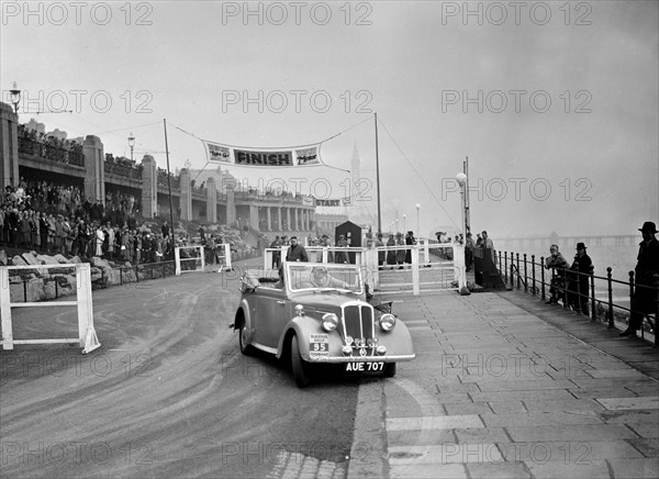 Standard Avon Twelve competing in the Blackpool Rally, 1936. Artist: Bill Brunell.