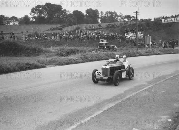 MG C type Midget of Goldie Gardner competing in the RAC TT Race, Ards Circuit, Belfast, 1932. Artist: Bill Brunell.