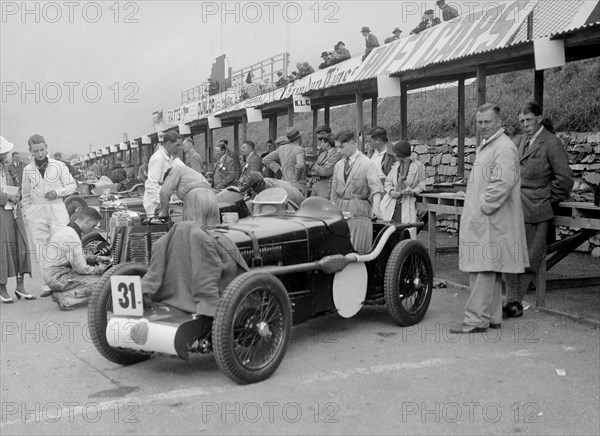 MG C type Midget of Cyril Paul in the pits at the RAC TT Race, Ards Circuit, Belfast, 1932. Artist: Bill Brunell.