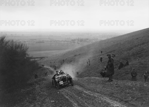 Austin Ulster competing in a trial, Crowell Hill, Chinnor, Oxfordshire, 1930s. Artist: Bill Brunell.