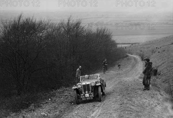 MG Magna competing in a trial, Crowell Hill, Chinnor, Oxfordshire, 1930s. Artist: Bill Brunell.