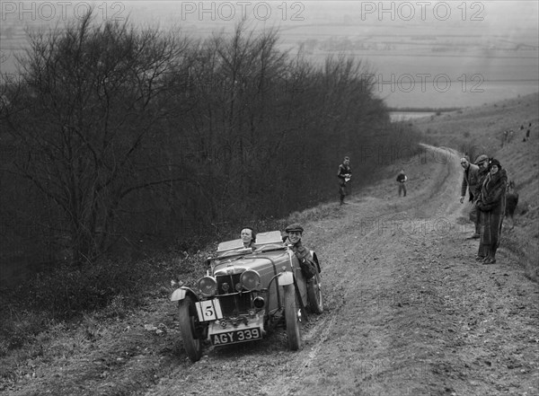 MG J2 competing in a trial, Crowell Hill, Chinnor, Oxfordshire, 1930s. Artist: Bill Brunell.