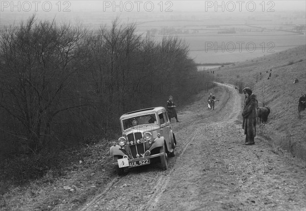 Standard Little Nine saloon competing in a trial, Crowell Hill, Chinnor, Oxfordshire, 1930s. Artist: Bill Brunell.