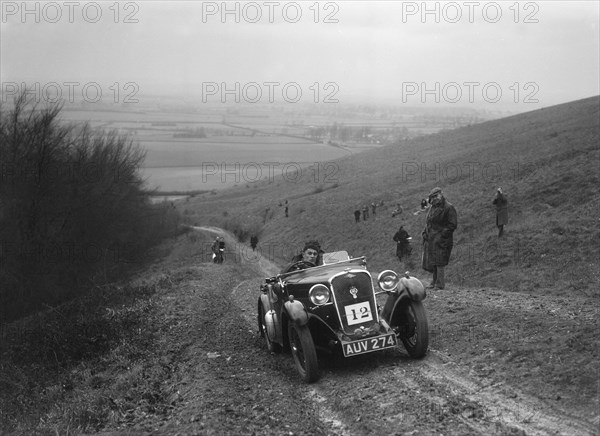 Singer 2-seater sports competing in a trial, Crowell Hill, Chinnor, Oxfordshire, 1930s. Artist: Bill Brunell.