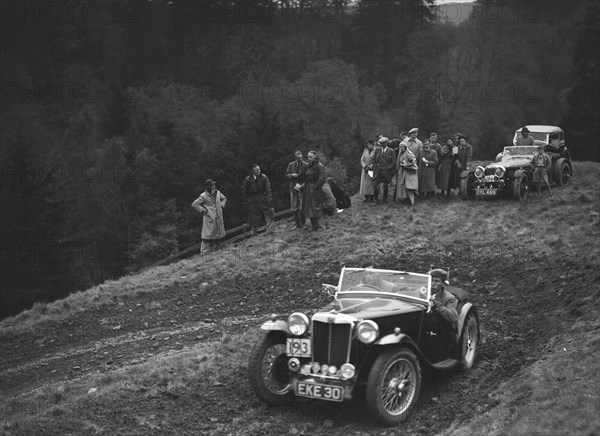 MG TA of JN Goodwin competing in the MCC Edinburgh Trial, Roxburghshire, Scotland, 1938. Artist: Bill Brunell.