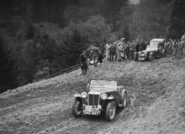 MG TA of RE Rushbrook competing in the MCC Edinburgh Trial, Roxburghshire, Scotland, 1938. Artist: Bill Brunell.