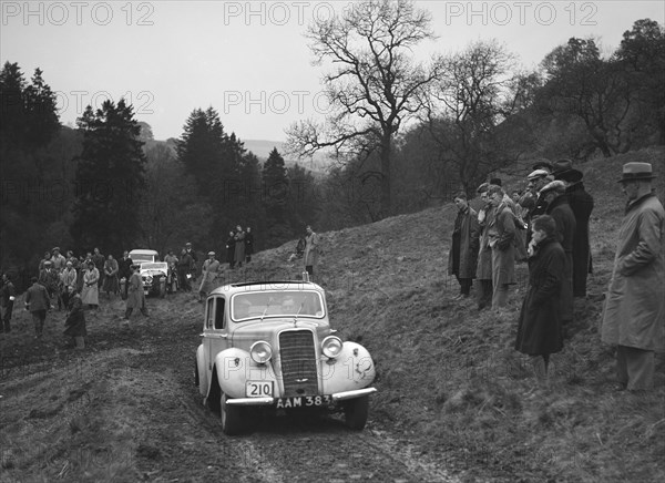 Hillman Minx of S Elgar competing in the MCC Edinburgh Trial, Roxburghshire, Scotland, 1938. Artist: Bill Brunell.