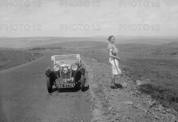 Kitty Brunell and her MG Magna at the RSAC Scottish Rally, 1932. Artist: Bill Brunell.