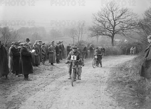 Unidentified motorcycle at an early motoring trial, pre 1914.   Artist: Bill Brunell.