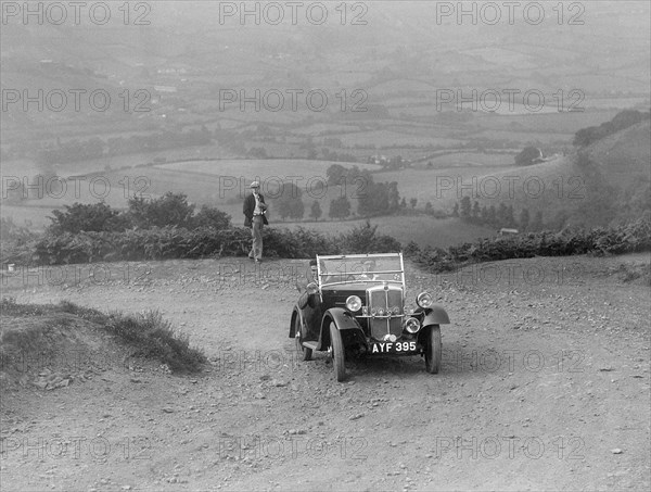 Morris Minor competing in the Barnstaple Trial, c1935. Artist: Bill Brunell.