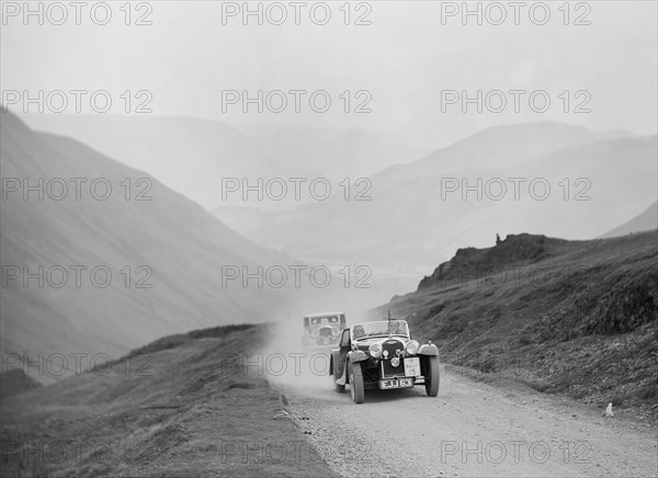 Morgan 4/4 2-seater of Miss DL Bean competing in the RAC Rally, 1938. Artist: Bill Brunell.