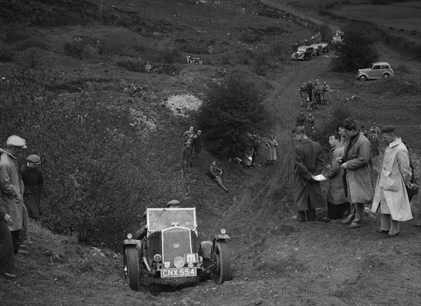 Wolseley competing in the MG Car Club Abingdon Trial/Rally, 1939. Artist: Bill Brunell.