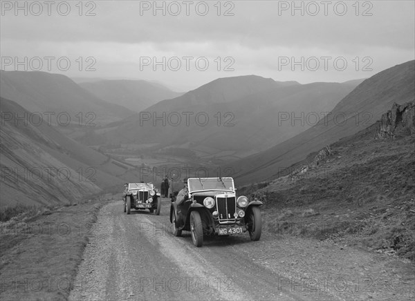 MG Magnette of WS Whittard and MG TA of Maurice Toulmin, MG Car Club Abingdon Trial/Rally, 1939. Artist: Bill Brunell.