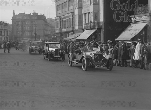 Alfa Romeo and Riley taking part in the London-Brighton Run, 1928. Artist: Bill Brunell.