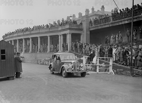 Wolseley of J Malkin competing in the Blackpool Rally, 1936. Artist: Bill Brunell.