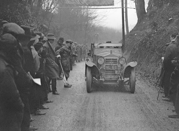 OM open 4-seater of PD Walker competing in the MCC Exeter Trial, 1928. Artist: Bill Brunell.