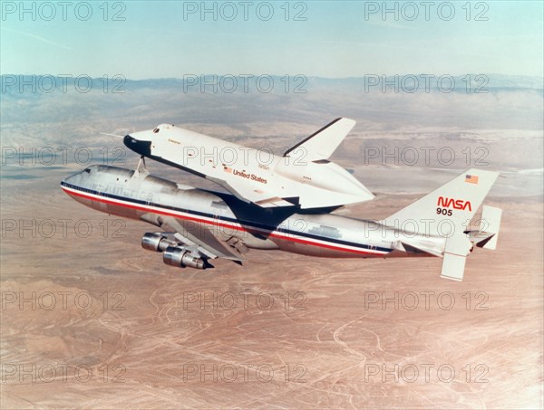 Space Shuttle Orbiter mounted on top of a Boeing 747 carrier aircraft, 1977. Artist: Unknown