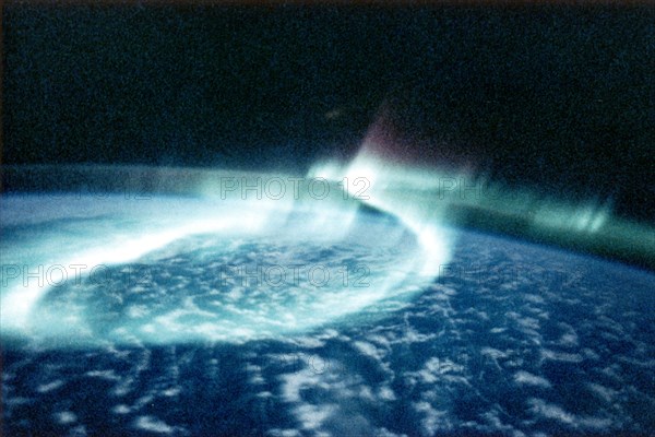 Aurora Borealis (Northern Lights) viewed from space. Artist: Unknown