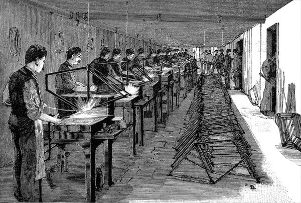 Welding bicycle frames in an American factory, 1900. Artist: Unknown