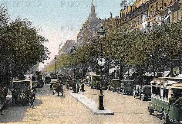 Boulevard des Italiens, Paris, with cars and motor buses on the street, c1900. Artist: Unknown