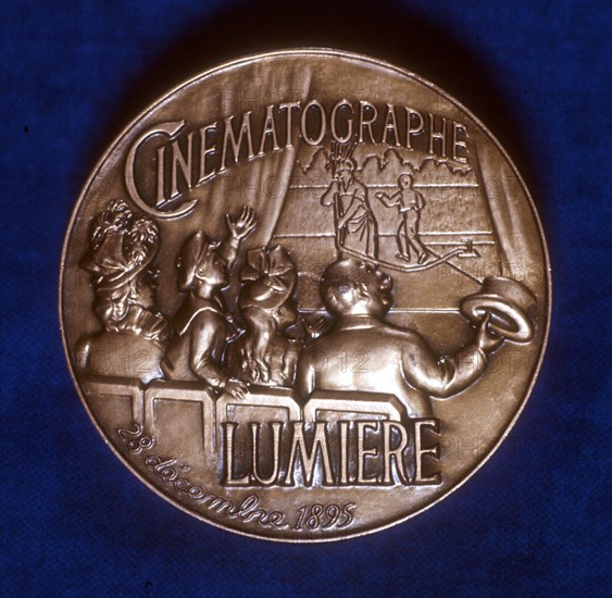 Reverse of medal commemorating 50 years of cinematography by the Lumiere brothers, 1945. Artist: Unknown