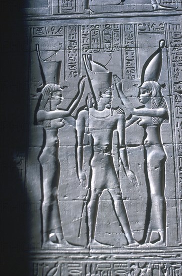 Relief of the Pharaoh between two goddesses, Temple of Horus, Edfu, Egypt, c251BC-c246BC. Artist: Unknown