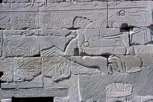 Detail of relief of Pharaoh in chariot riding down his enemies, Temple of Amun, Karnak, c1400 BC. Artist: Unknown