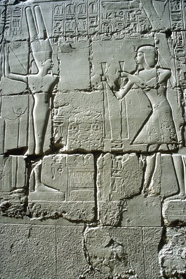 Relief of Rameses II offering to the fertility god Min, Temple of Amun, Karnak, Egypt. Artist: Unknown