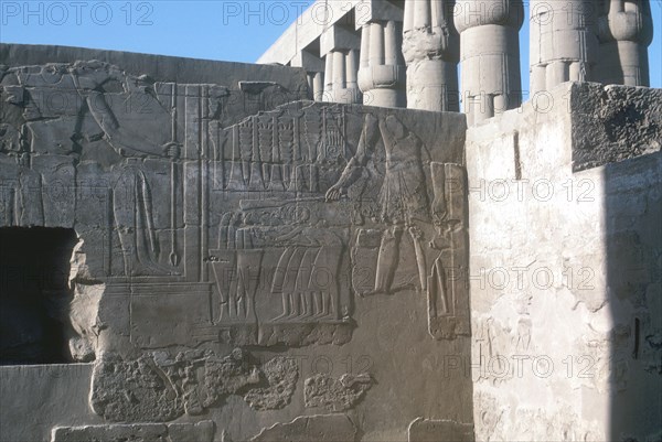 Relief of the Pharaoh smiting his enemies, Temple sacred to Amun, Mut and Khons, Luxor, Egypt. Artist: Unknown