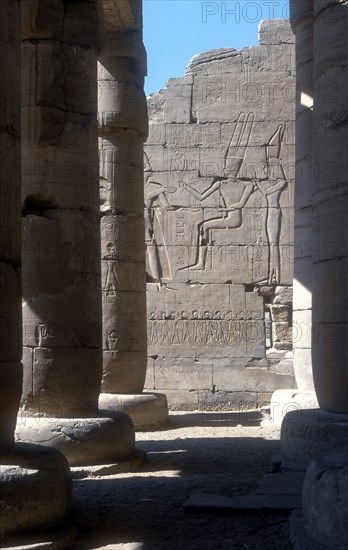 View through to relief of Rameses II before Amun & Mut, Temple of Rameses II, Luxor, Egypt. Artist: Unknown