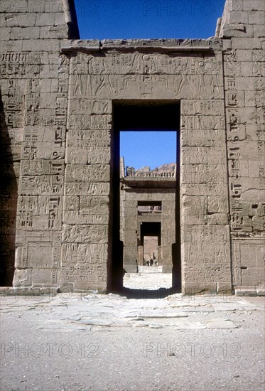 View through the Pylons, Mortuary Temple of Rameses III, Medinat Habu, Luxor, c12th century BC. Artist: Unknown