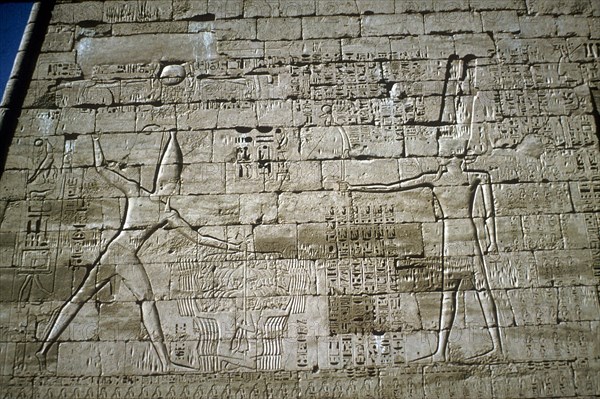 Relief of Rameses III smiting enemies, Mortuary Temple of Rameses III, Medinat Habu, c1200BC. Artist: Unknown