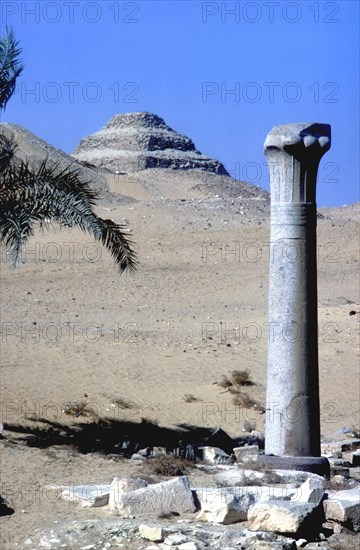 Step Pyramid of King Djoser (Zozer) behind ruins of temple, Saqqara, Egypt, c2600 BC. Artist: Imhotep