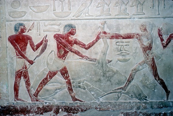 Wallpainting of 3 butchers cutting up a carcase, Tomb of Idut, 5th Dynasty, c2350 BC. Artist: Unknown