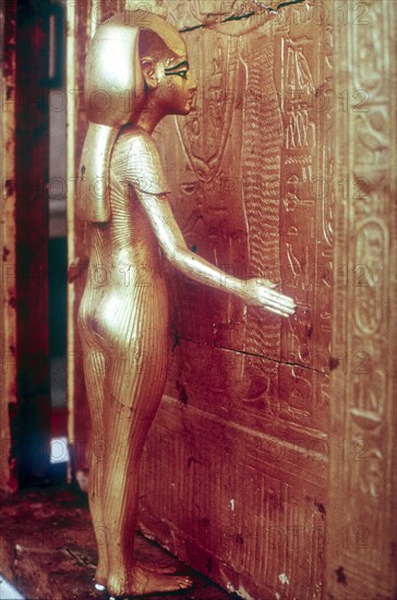 Isis the protective goddess guarding the Canopic Shrine, Tomb of Tutankhamun, Cairo. Artist: Unknown