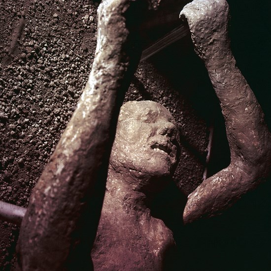 Plaster Cast of a victim of the eruption of Vesuvius at Pompeii, Italy. Creator: Unknown.