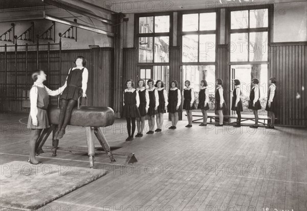 Rowntree girls in an indoor gymnastics class, 1930. Artist: Unknown