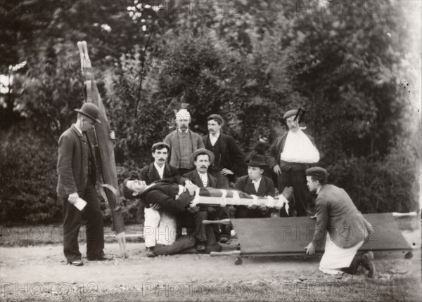 Rowntree employees practice first aid, 1910. Artist: Unknown