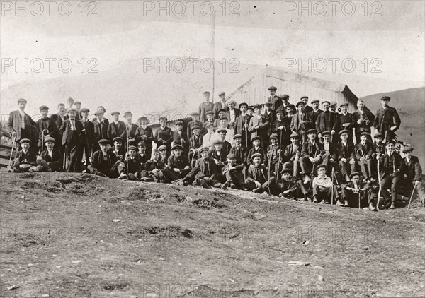 Rowntree boys outside the half-way house whilst climbing Skiddaw, Cumbria,1909. Artist: Unknown