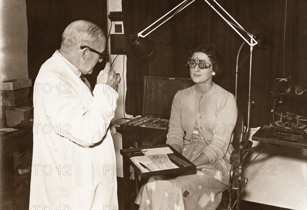 Rowntree optician at work, York, Yorkshire, 1956. Artist: Unknown