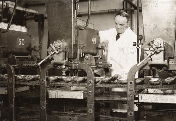 Easter egg moulding machine, Rowntree factory, York, Yorkshire, 1930. Artist: Unknown