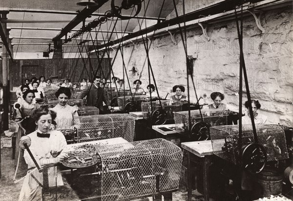 Toffee wrapping machines, Mackintosh factory, Halifax, West Yorkshire, 1912. Artist: Unknown