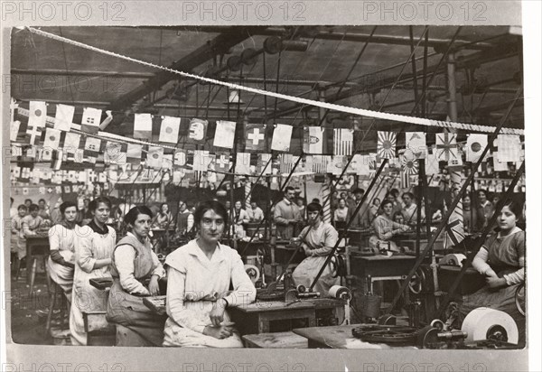 Women sat by their machines, Mackintosh Factory, Halifax, West Yorkshire, 1918. Artist: Unknown