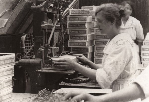 Nailing machine, Rowntree factory, York, Yorkshire, 1920. Artist: Unknown